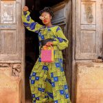 JUMPSUIT WITH DETACHABLE CAPE AND EXAGGERATED SLEEVES